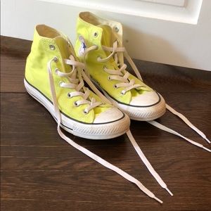 Yellow high top converse